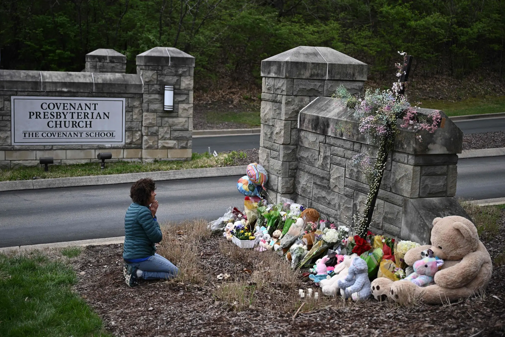 Praying at shooting site